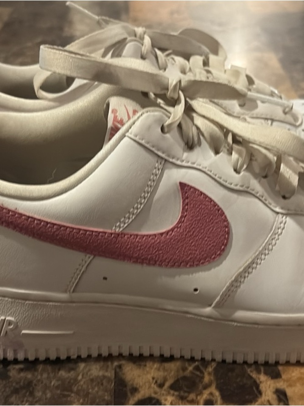 Nike White Low-Top Sneakers with Pink Swoosh